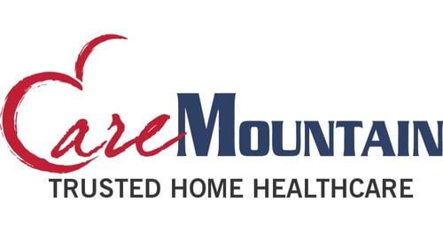 Care Mountain logo: red script "Care" with a heart above the C, bold navy "Mountain," and the tagline "Trusted Home Healthcare."