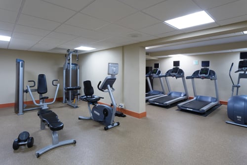 The Fitness Center includes a recumbent bike and stepper.