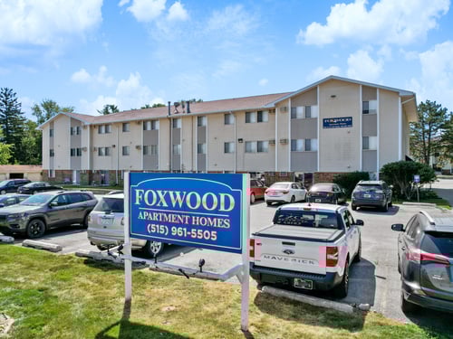 Foxwood Apartments signaling in front of the apartment complex building, Indianola, IA
