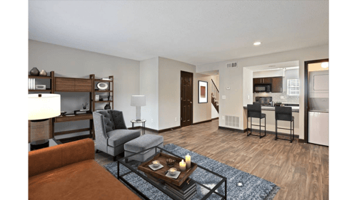 Living Room With Kitchen View at Artesian East Village in Atlanta, GA 30316