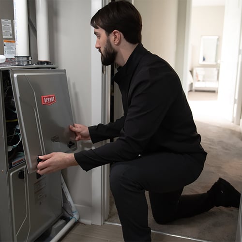 A Bryant dealer performs furnace installation service.