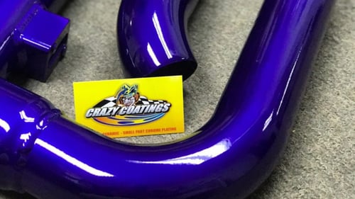 blue coated car parts with business card