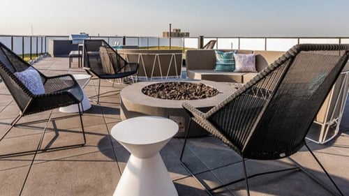 Rooftop terrace with fire pit.
