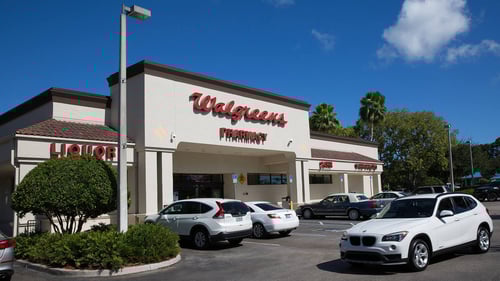 White cars in Walgreens parking lot