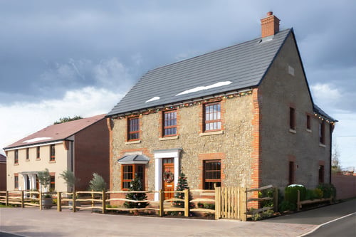 External shot of the show homes with christmas lights at sylvan