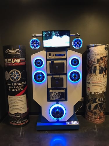 Marine-grade audio display featuring Wet Sounds speakers and subwoofers.