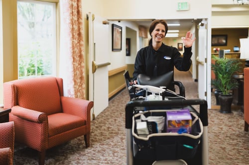 mobile dentist walking through nursing home