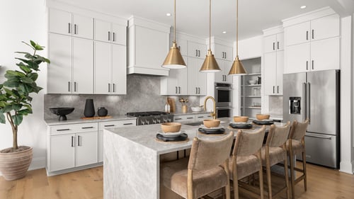 Gourmet kitchen boasts a large center island and stainless steel appliances