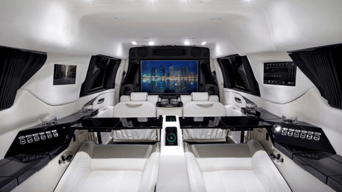 White luxury seating inside custom vehicle
