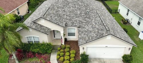 aerial of gray and white asphalt shingle roof replacement in fort lauderdale