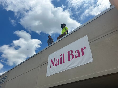 Installing a new packaged HVAC unit at a Nail Salon
