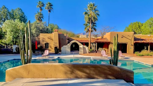 Living room with wood floors and sofa at La Hacienda Apartment, Tucson, AZ, 85712