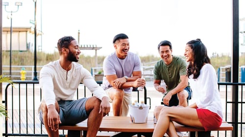 Friends on patio at Boardwalk Saloon at Caesars Atlantic City.