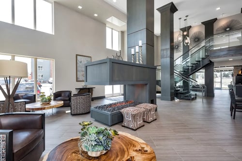 Spacious lobby at Westwood Green Apartments with modern furnishings and stylish seating.