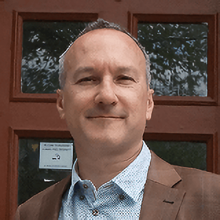 Headshot of Dustin Friesen