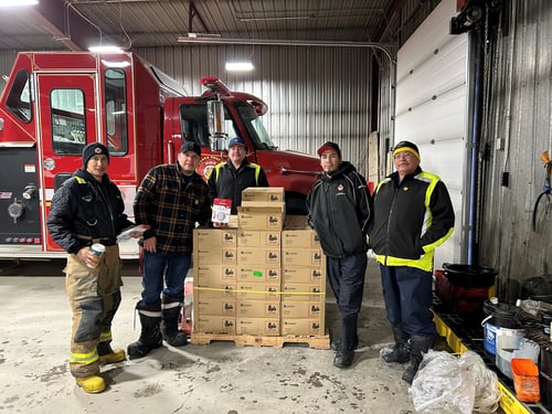 Cross Lake Nation firefighters preparing to install Kidde smoke alarms