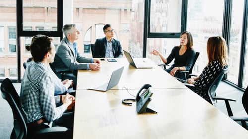Business people in discussion during meeting in office