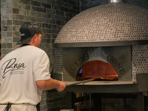 Brasa Restaurant in Ocean City, Maryland, featuring food, drinks, dining, and a welcoming restaurant atmosphere.