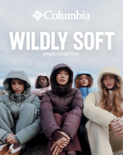 women wearing jackets sitting in the cold