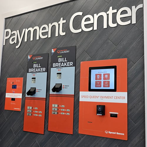 Speed Queen Laundry self-service payment center with customer payment kiosks