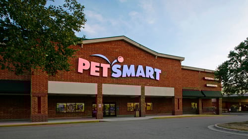 Trees on either side of the entrance to Pet Smart