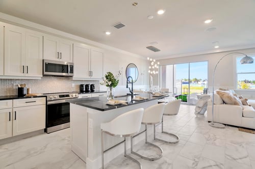 The Kitchen of a DRB Homes Abaco Model at Lagoon Residences at Epperson in Wesley Chapel, FL.
