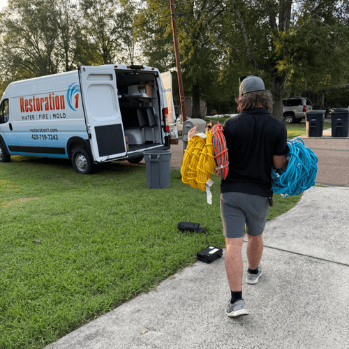 Restoration 1 owner stocking van to go on emergency call.