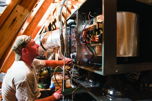 Furnace repair in the attic