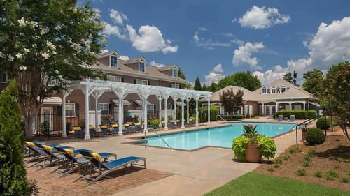 Community pool with sundeck.