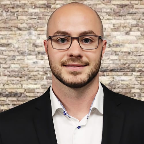 Headshot of Jarrett Daoust