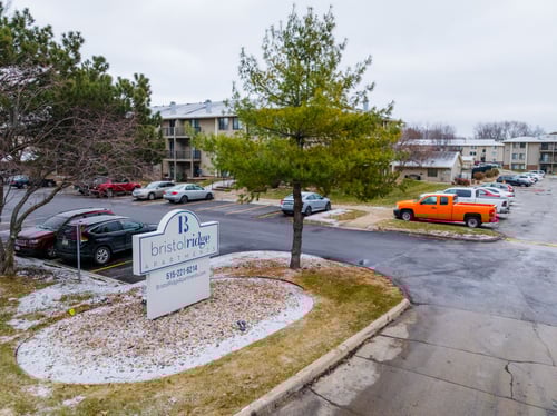 Bristol Ridge Logo in front of an outdoor parking in Urbandale, IA