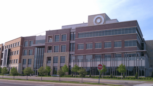 exterior of building with lots of windows that have window tinting