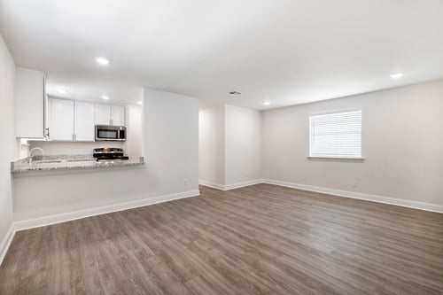 Open Living Spaces & Vinyl Plank Flooring Throughout