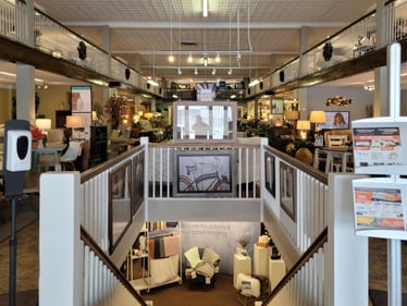 Slumberland Furniture Store in Devils Lake,  ND - Showroom main staircase