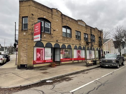 Brick building with Red State Farm sign