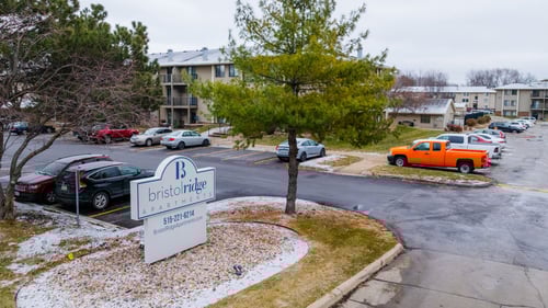 Bristol Ridge Logo in front of an outdoor parking in Urbandale, IA