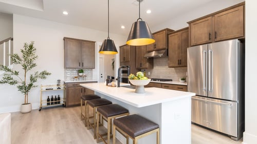 Well-appointed gourmet kitchens with large center island and walk-in pantry