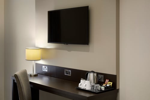 Premier Inn room with desk, flatscreen TV and tea/coffee-making facilities