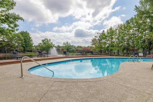 Pool with Sun Deck at The Waters at Chenal Apartments in Little Rock, AR