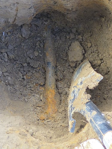 An extremely corroded galvanized supply line.