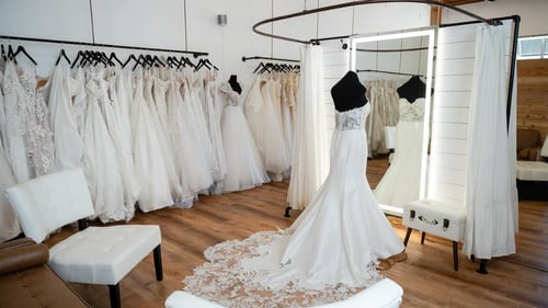 Large room full of wedding dresses
