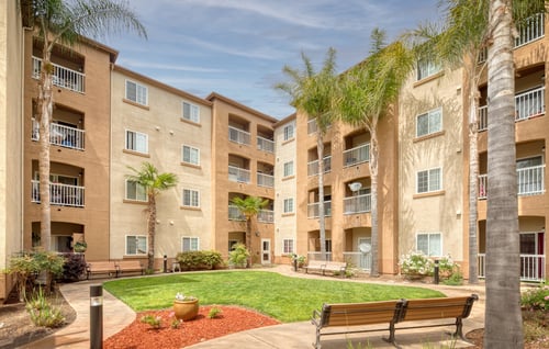 Courtyard with Walking Paths at Hayward Village Senior Apartments in Hayward, CA