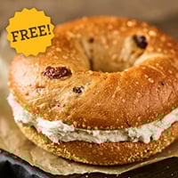 Einstein Bros. Bagels cinnamon raisin bagel with cream cheese for National Bagel Day 2026