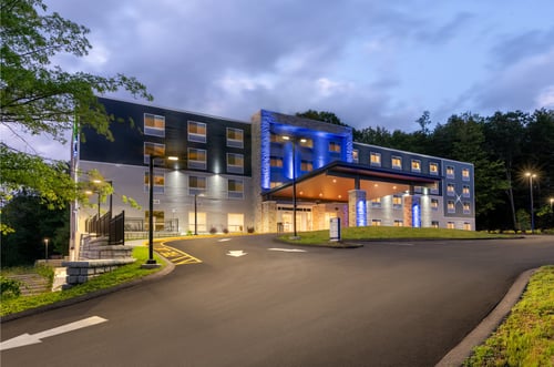 Exterior of hotel at dusk