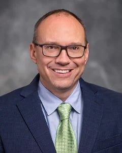 Dr Bill J. Andrews