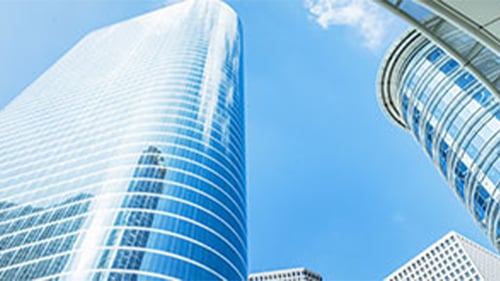 high rise buildings with blue sky