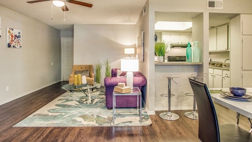 Dining room and kitchen room at Newport Apartments in Irving, TX