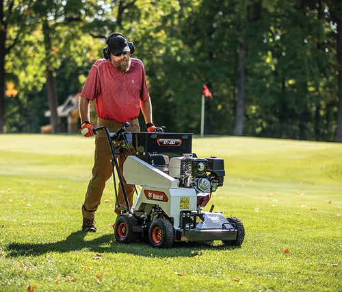Operator uses a Bobcat-dt20-Dethatcher on a Large Lawn