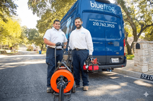 plumbers outside truck with equipment