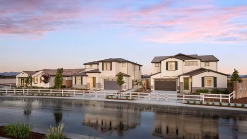 Street view of model homes in Sage at Park West by Pulte Homes in Perris, CA.